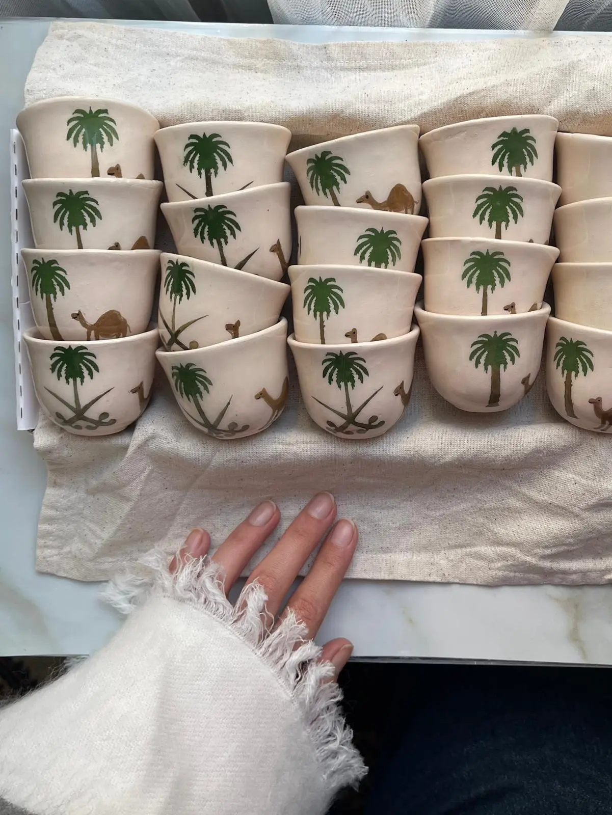 Duha Khaled, founder of Pottery Studio, at her wheel in Mersin